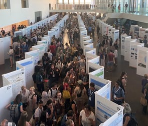 Conference poster hall full of people