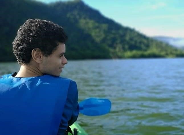 Zabdiel Roldan Ayala, 2021 FlowCam student grant recipient, in a kayak