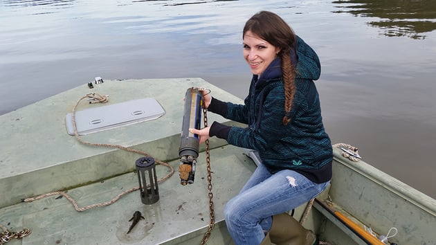 CTCLUSI tribe member Ashley Russell showing off sculpin eggs on monitoring equipment