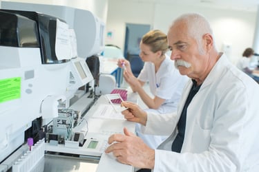 Scientists using lab instruments