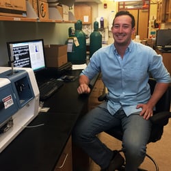 FlowCam grant winner, Nick Ray, with FlowCam in lab