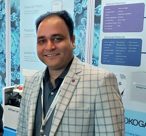 Bhushan Pandit at FlowCam trade show booth
