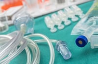 Close up of saline drip supplies, as an example of single-use technologies in biopharma