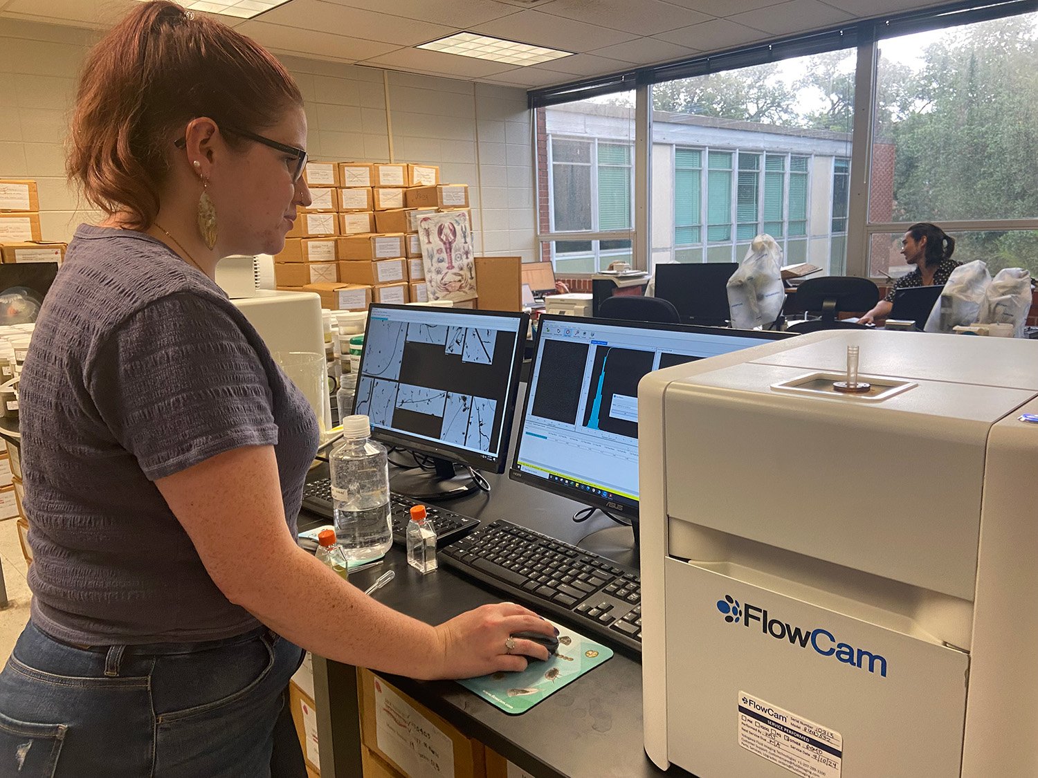 Student using FlowCam in lab