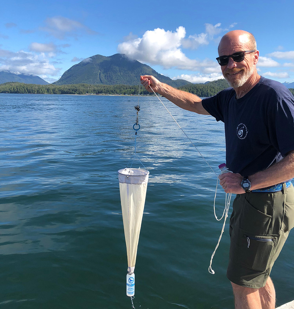 FlowCam scientist collecting a water sample off the coast of Vancouver