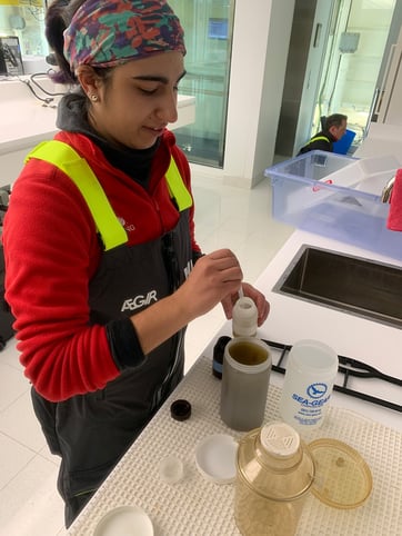 Woman in lab preparing sample