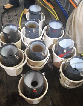 9 buckets holding samples