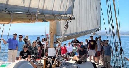 Group photo of FlowCam team on sailboat