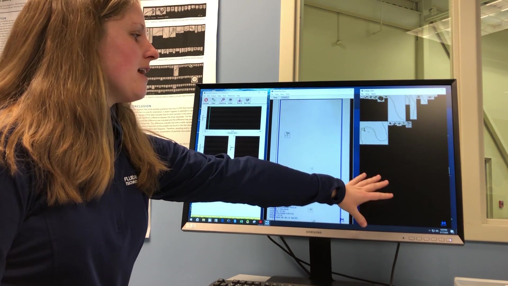 FlowCam scientist demonstrating technology on monitor